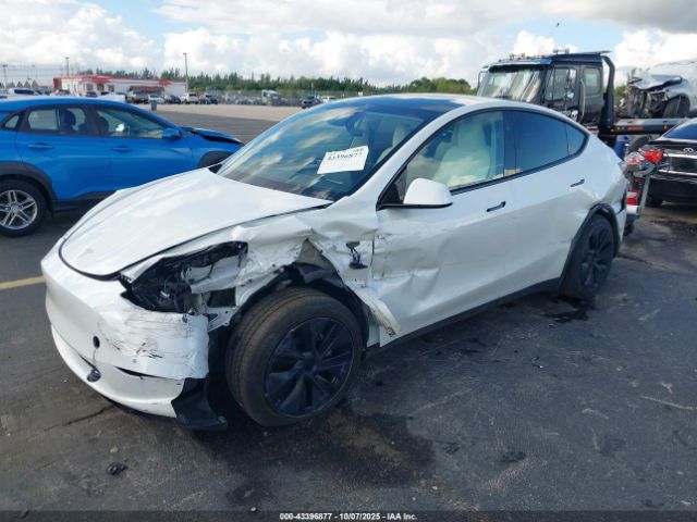2024 TESLA MODEL Y 7SAYGDED0RF112915 Photo 1