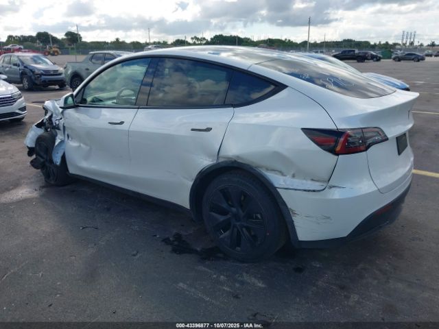 2024 TESLA MODEL Y 7SAYGDED0RF112915 Photo 2