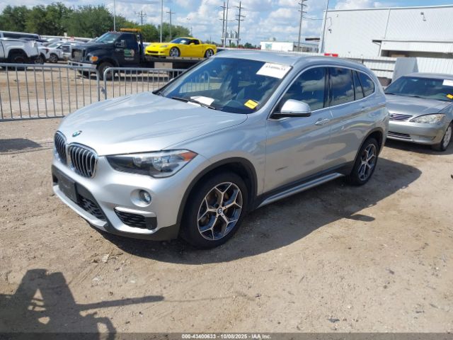 2018 BMW X1 WBXHT3C38J5L26332 Photo 1