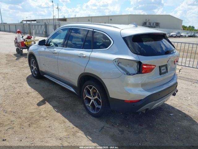 2018 BMW X1 WBXHT3C38J5L26332 Photo 2