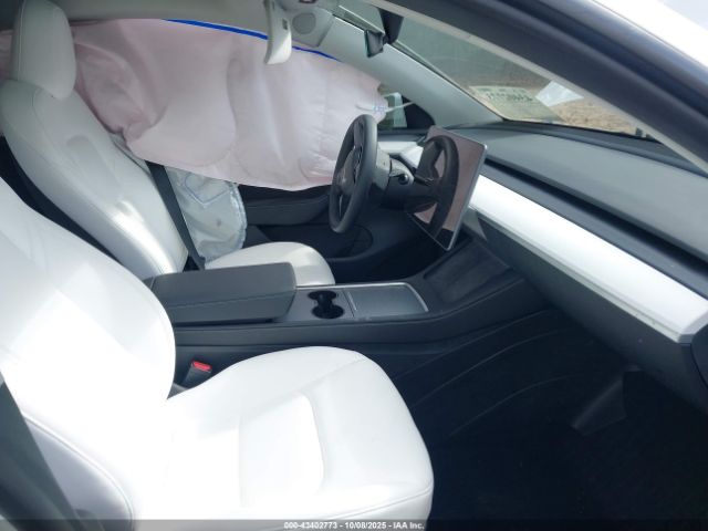 2023 TESLA MODEL Y 7SAYGDEE2PF697616 Photo 4