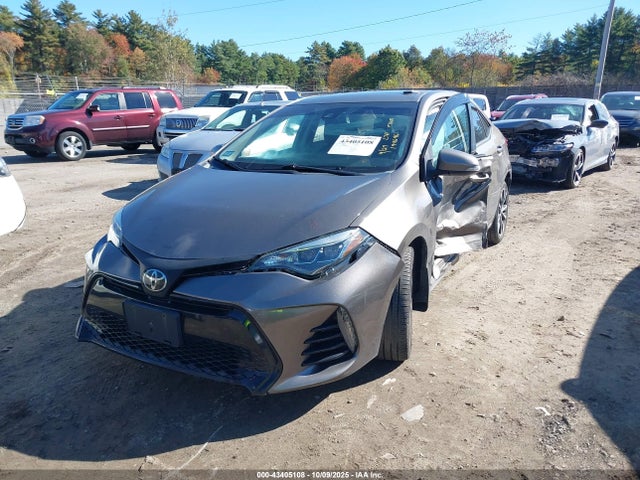 2017 TOYOTA COROLLA 2T1BURHE5HC881975 Photo 1