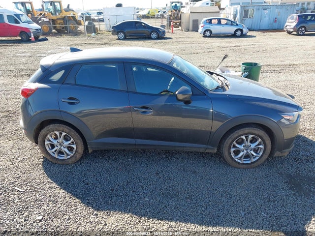 Mazda pe 2016 JM1DKFB7XG0134145 Image 13