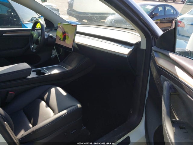 2023 TESLA MODEL Y 7SAYGDEE6PF870456 Photo 4