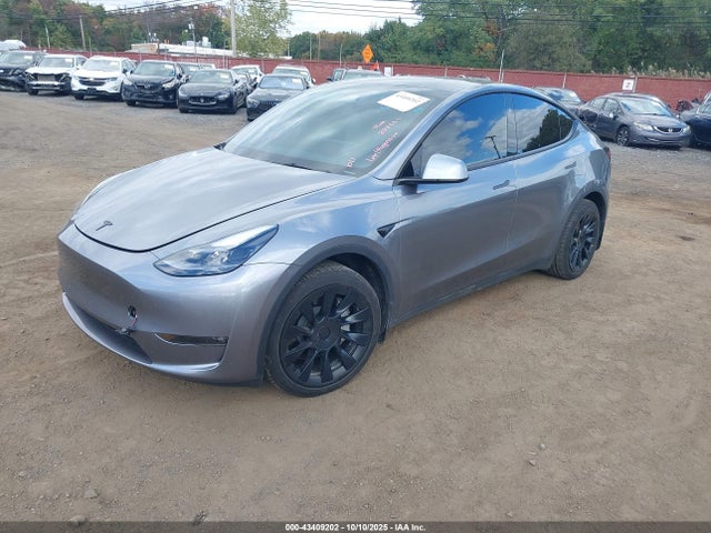 2024 TESLA MODEL Y 7SAYGAEE3RF133068 Photo 1