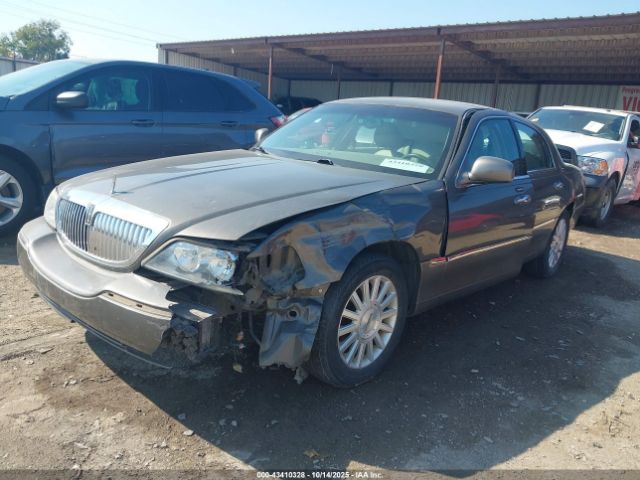 2004 LINCOLN TOWN CAR 1LNHM81W24Y663131 Photo 1
