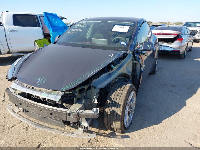2023 TESLA MODEL Y 7SAYGAEE9PF969545 Photo 1