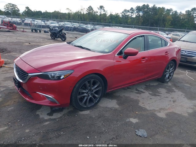 JM1GJ1W53G1432395 Mazda py