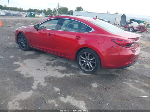 JM1GJ1W53G1432395 Mazda py