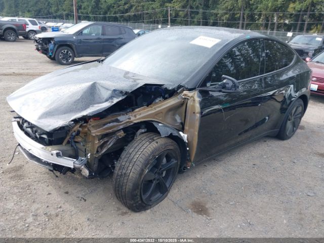 2026 TESLA MODEL Y 7SAYGDEE3TF358101 Photo 1