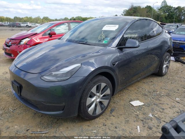 2023 TESLA MODEL Y 7SAYGDEE3PF605171 Photo 1