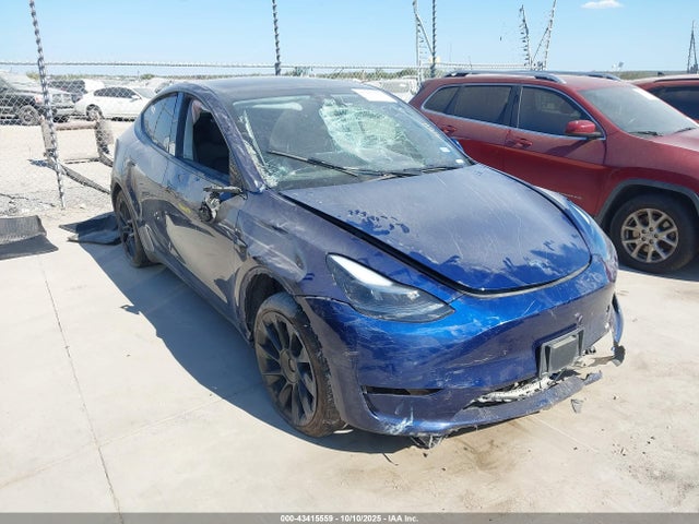2024 TESLA MODEL Y 7SAYGDEE3RA307154 Photo 0