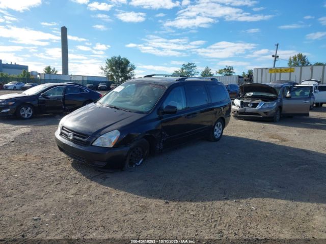 2009 KIA SEDONA KNDMB233596315450 Photo 1