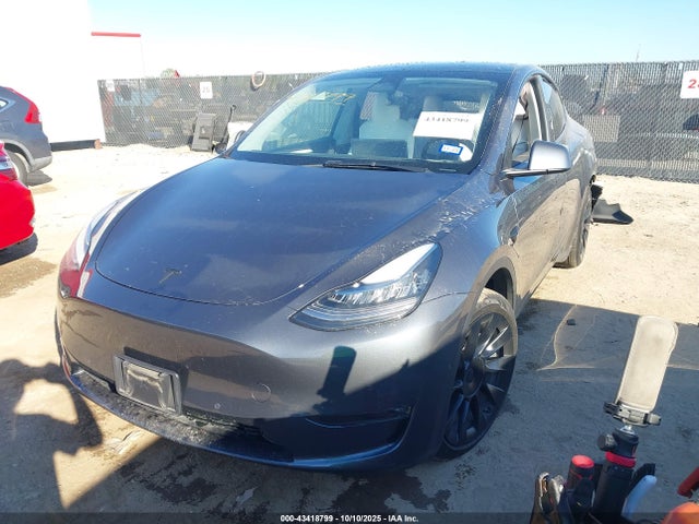 2023 TESLA MODEL Y 7SAYGAEE5PF584659 Photo 1