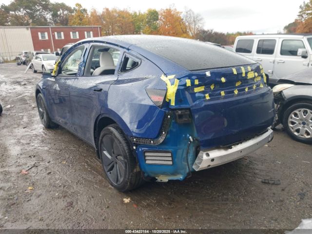 2026 TESLA MODEL Y 7SAYGDEE9TA408657 Photo 2