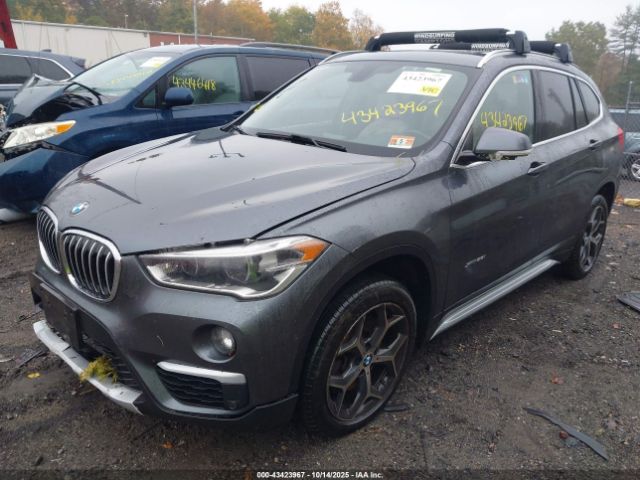 2017 BMW X1 WBXHT3C35H5F84692 Photo 1