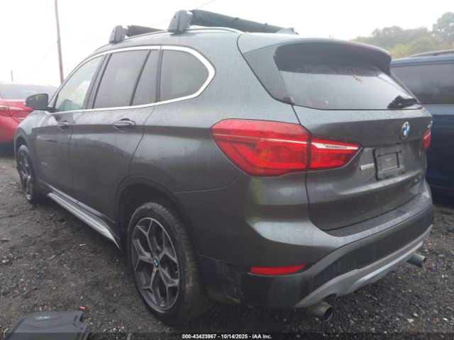 2017 BMW X1 WBXHT3C35H5F84692 Photo 2