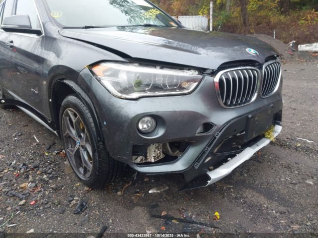 2017 BMW X1 WBXHT3C35H5F84692 Photo 5