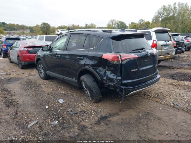 2018 TOYOTA RAV4 HYBRID JTMRJREV0JD241600 Photo 2