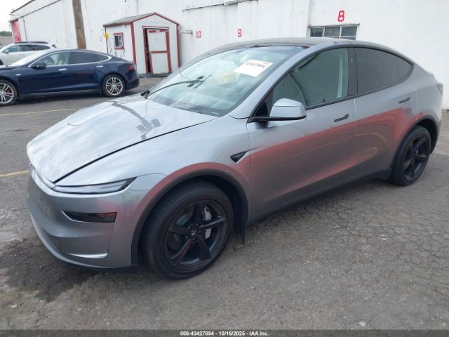 2026 TESLA MODEL Y 7SAYGDEE9TF408550 Photo 1