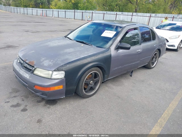 1997 NISSAN MAXIMA JN1CA21D0VT202773 Photo 1