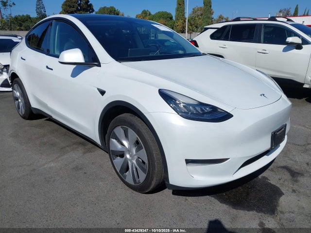 2023 TESLA MODEL Y 7SAYGDEE7PA084565 Photo 0