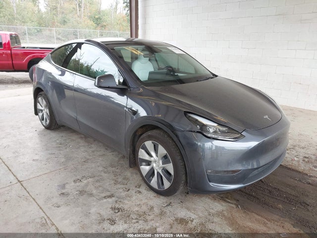 2023 TESLA MODEL Y 7SAYGDEE0PF886720 Photo 0