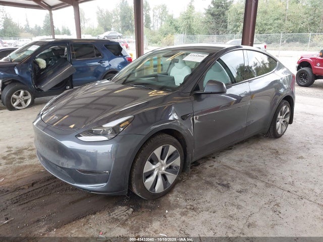 2023 TESLA MODEL Y 7SAYGDEE0PF886720 Photo 1