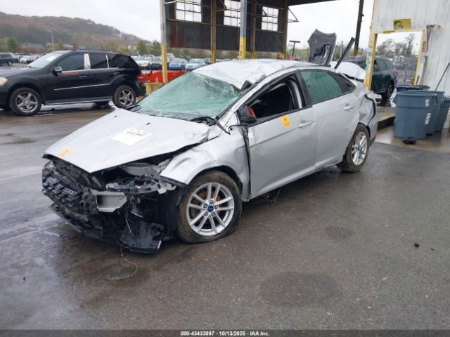 2015 FORD FOCUS 1FADP3F22FL273879 Photo 1