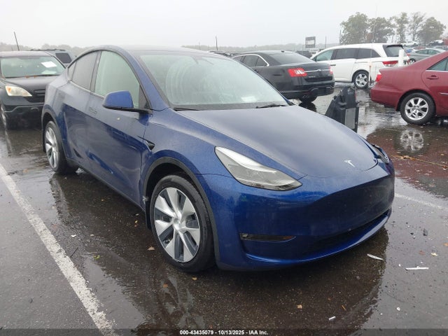 2023 TESLA MODEL Y 7SAYGAEE0PF882228 Photo 0