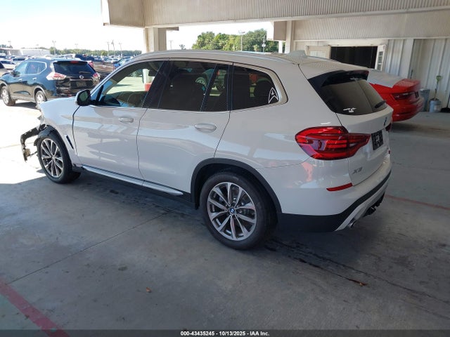 2019 BMW X3 5UXTR9C58KLE12409 Photo 2