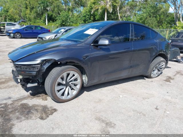 2026 TESLA MODEL Y 7SAYGDED9TA440323 Photo 1