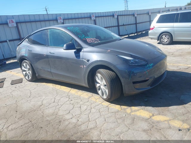 2023 TESLA MODEL Y 7SAYGDEE4PF609584 Photo 0