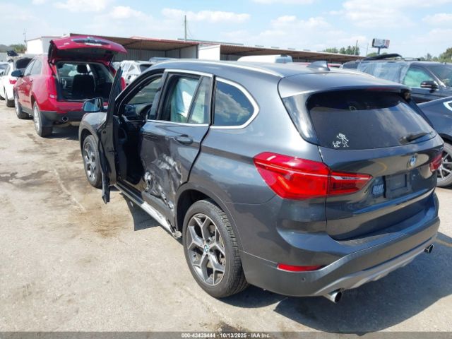 2016 BMW X1 WBXHT3C36G5E53267 Photo 2