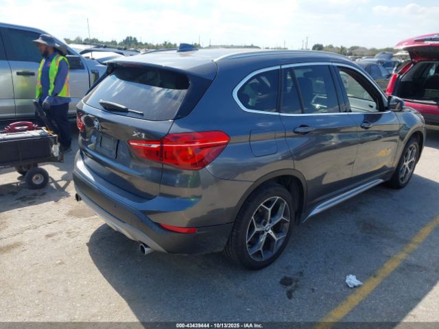 2016 BMW X1 WBXHT3C36G5E53267 Photo 3