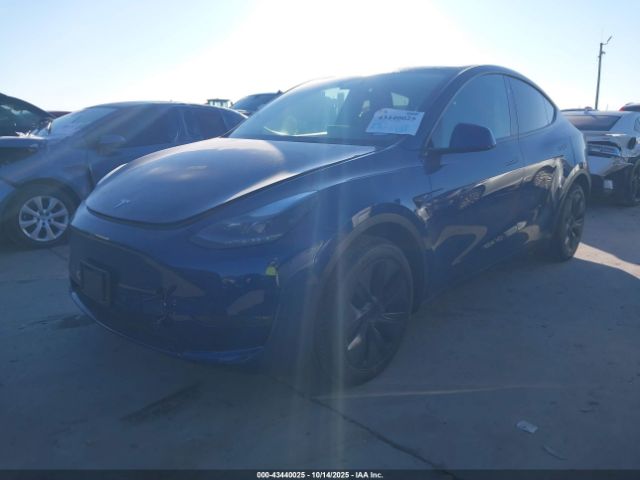 2024 TESLA MODEL Y 7SAYGDEE9RA305070 Photo 1