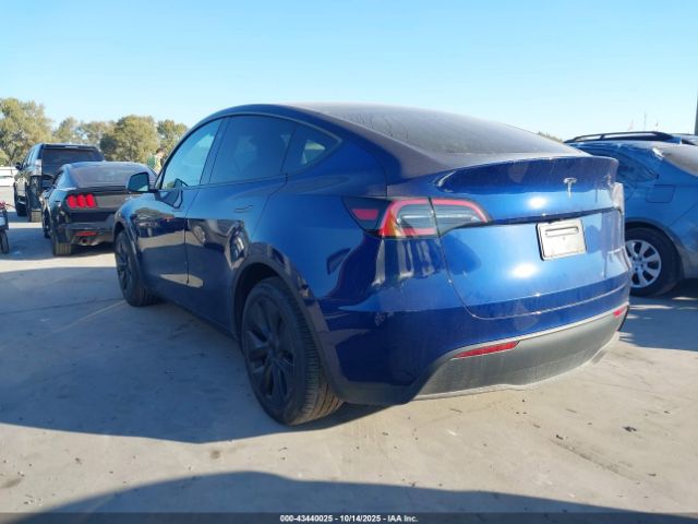 2024 TESLA MODEL Y 7SAYGDEE9RA305070 Photo 2