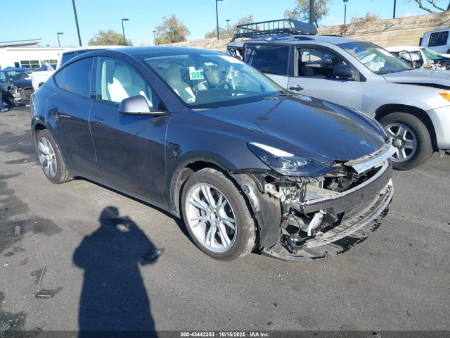 2023 TESLA MODEL Y 7SAYGAEE9PF662232 Photo 0