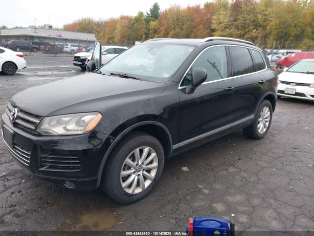 2011 VOLKSWAGEN TOUAREG WVGFF9BP6BD004651 Photo 1