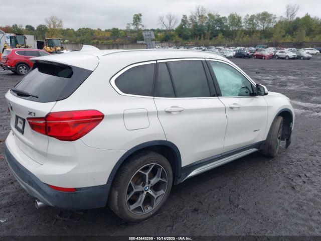 2017 BMW X1 WBXHT3C3XH5F86602 Photo 3