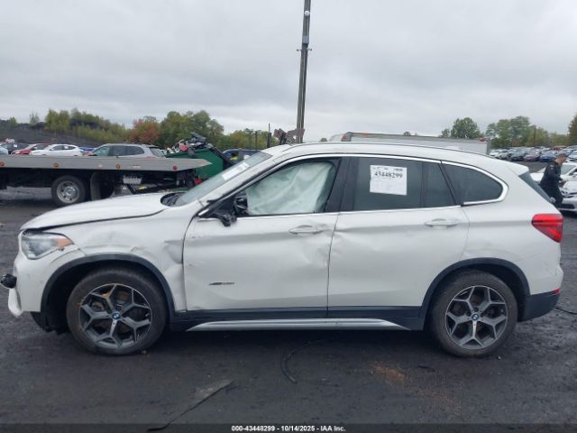 2017 BMW X1 WBXHT3C3XH5F86602 Photo 5