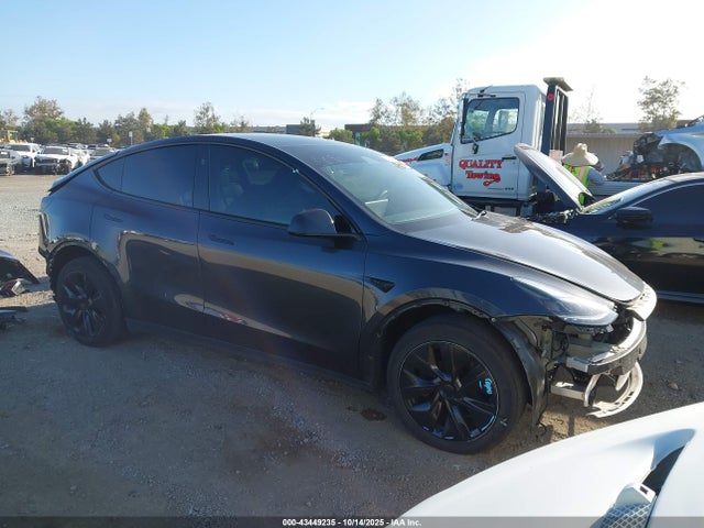 2024 TESLA MODEL Y 7SAYGDED9RF186690 Photo 0
