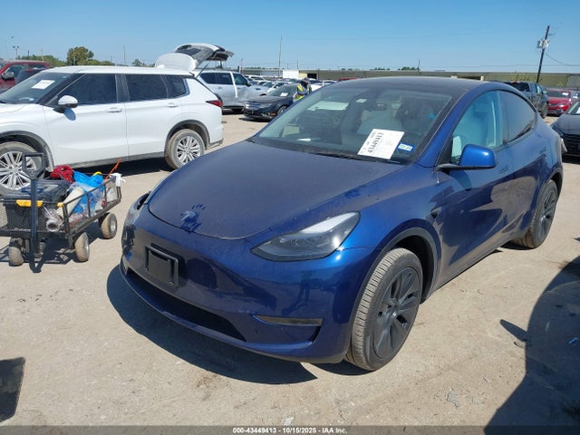 2025 TESLA MODEL Y 7SAYGDED0SA355997 Photo 1
