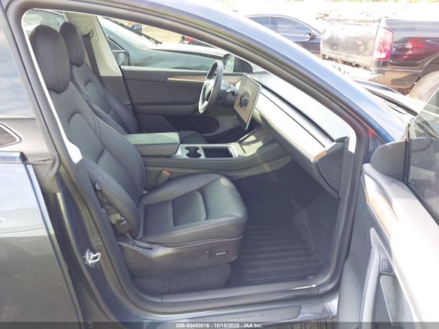 2023 TESLA MODEL Y 7SAYGDEE8PF598072 Photo 4