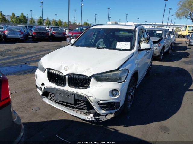 2017 BMW X1 WBXHU7C36H5H37696 Photo 5