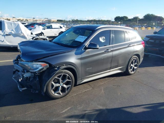 2016 BMW X1 WBXHT3C34G5E50836 Photo 1