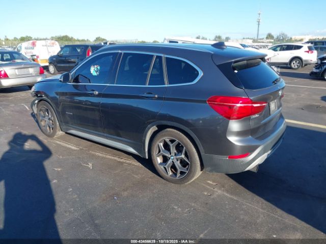 2016 BMW X1 WBXHT3C34G5E50836 Photo 2