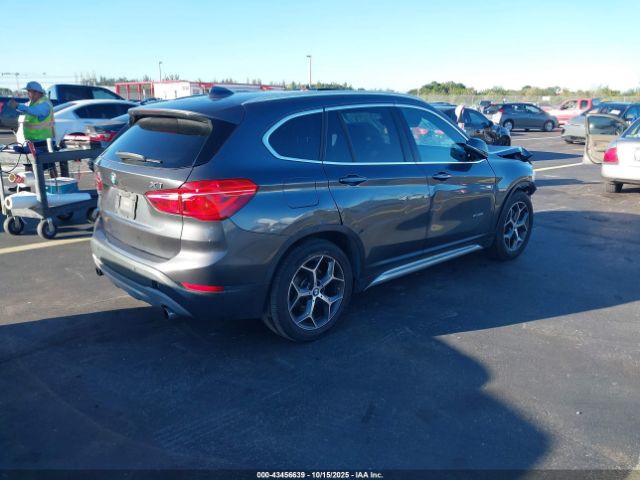 2016 BMW X1 WBXHT3C34G5E50836 Photo 3