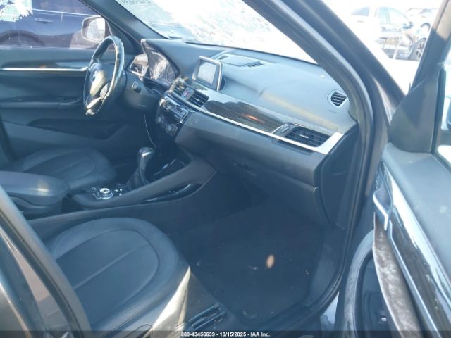 2016 BMW X1 WBXHT3C34G5E50836 Photo 4