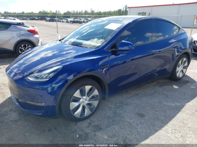 2021 TESLA MODEL Y 5YJYGDED2MF114610 Photo 1